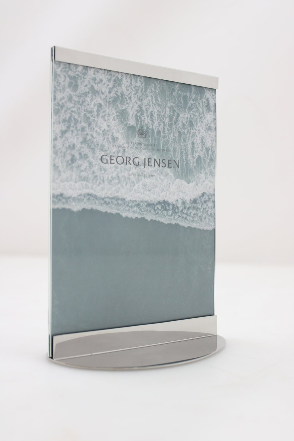 Georg Jensen Sky myndarammi í B-flokki, meðalstór 13x18 cm, úr ryðfríu stáli