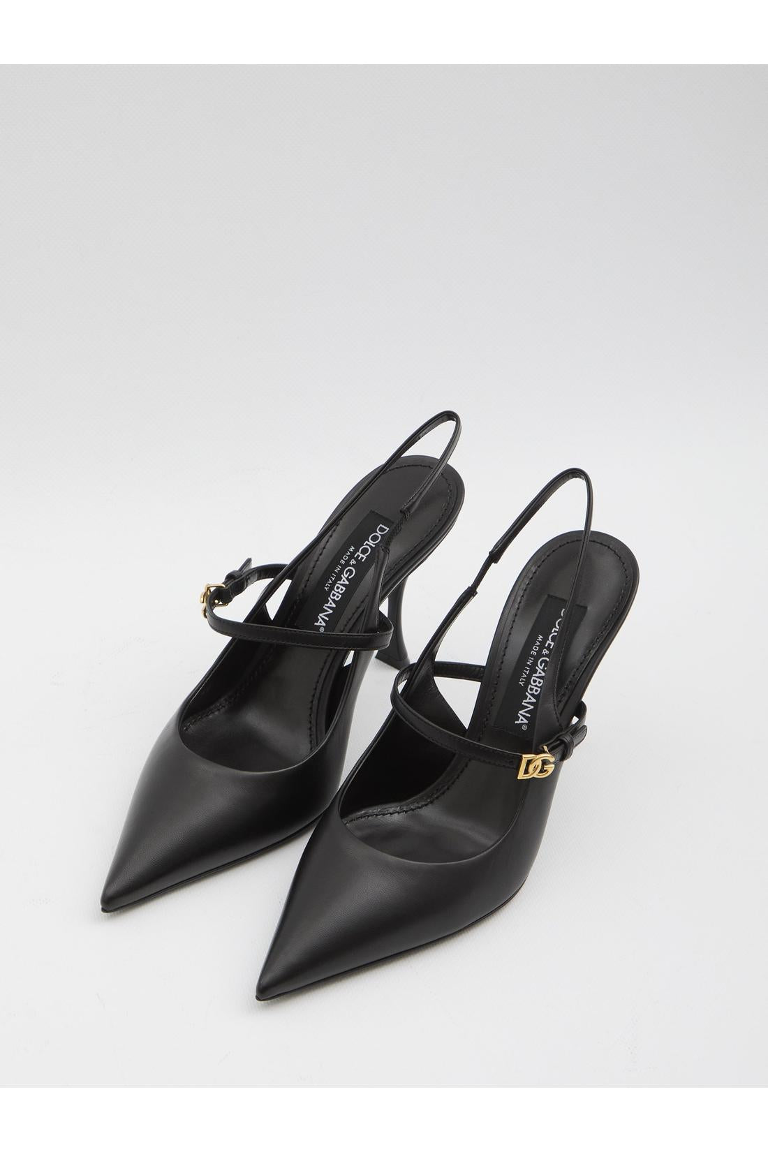 Black leather slingback pumps