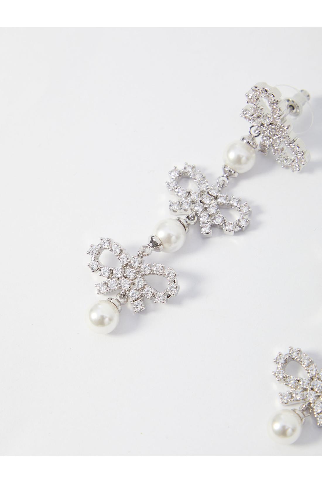 Micro bow pearl tiered earrings