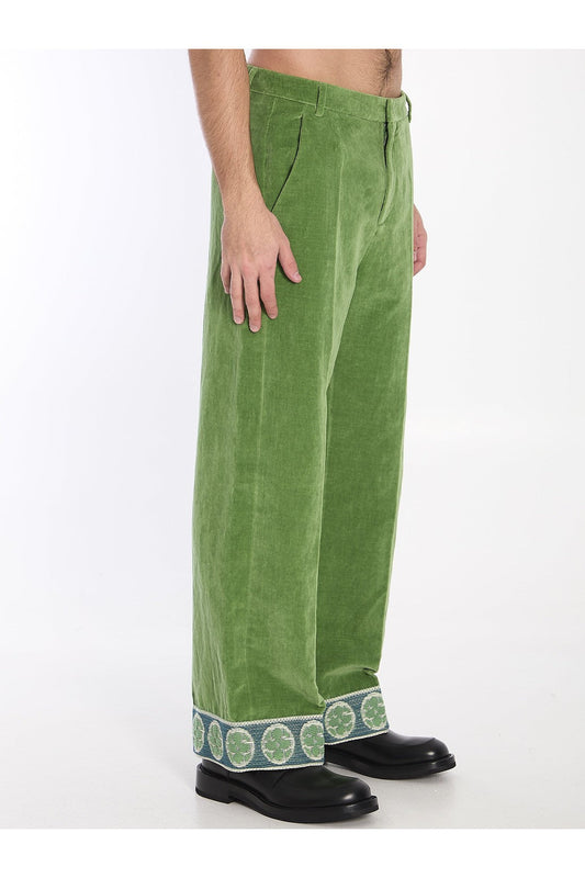 Velvet trousers with jacquard hems