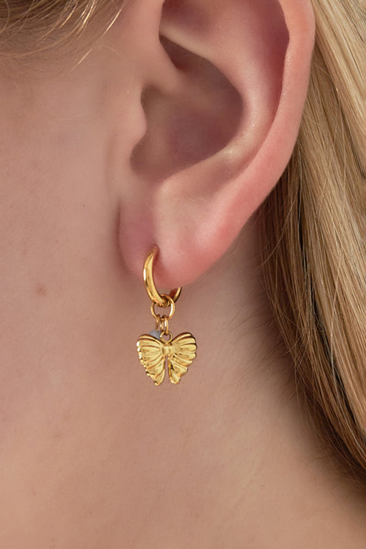 Ohrringe mit hängendem Schleifenanhänger und Perle