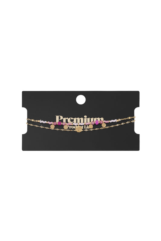 Armband mit rosa Anhängern - Goldfarben