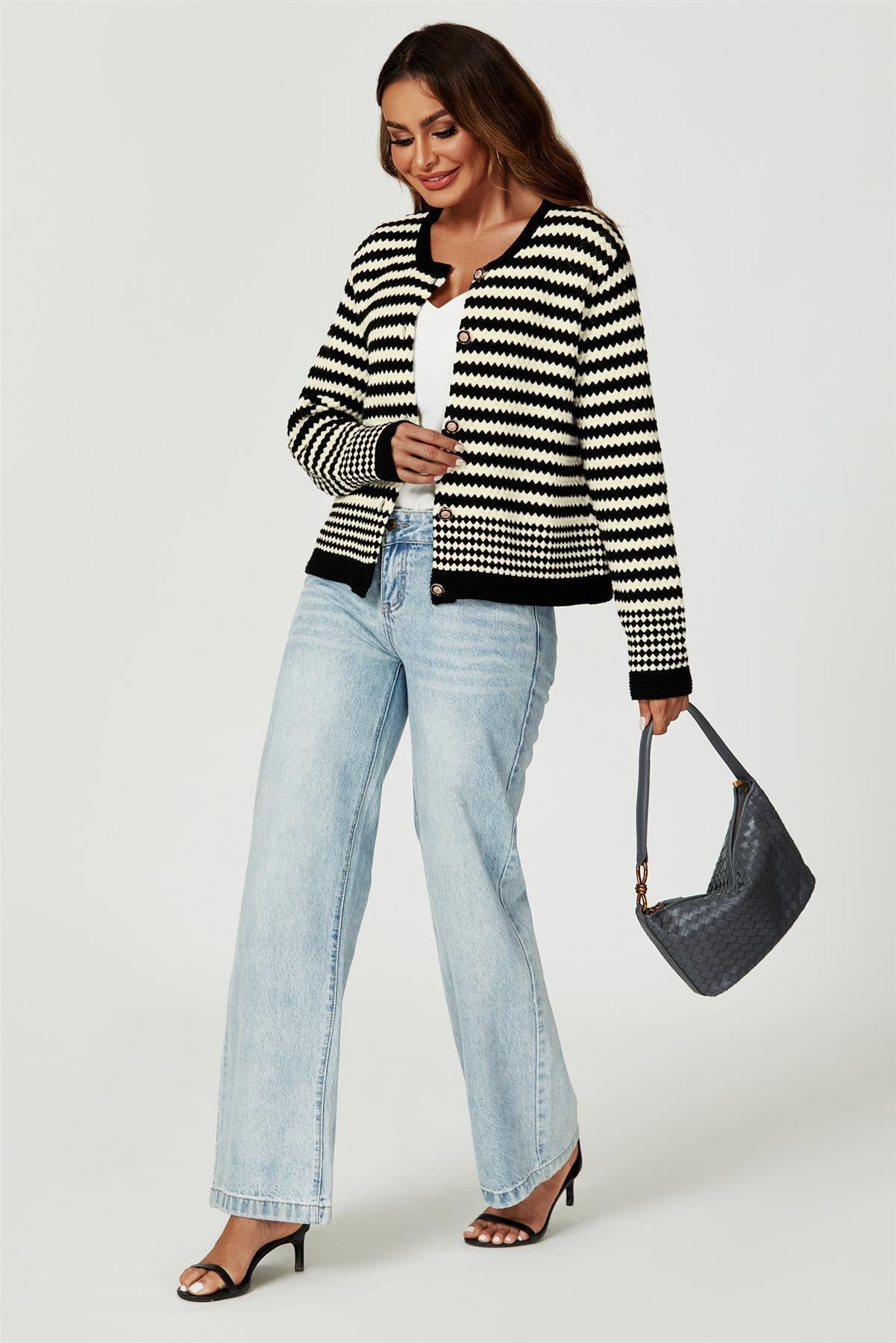 Prjónuð peysa með geo-mynstri og svörtu