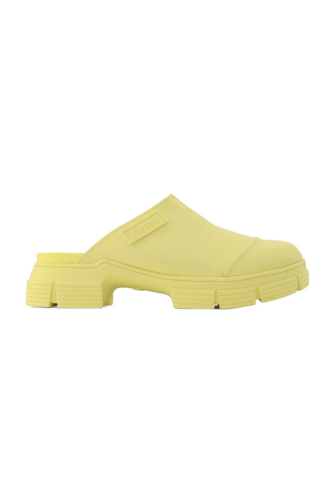 Pantoletten aus recyceltem Gummi Gelb