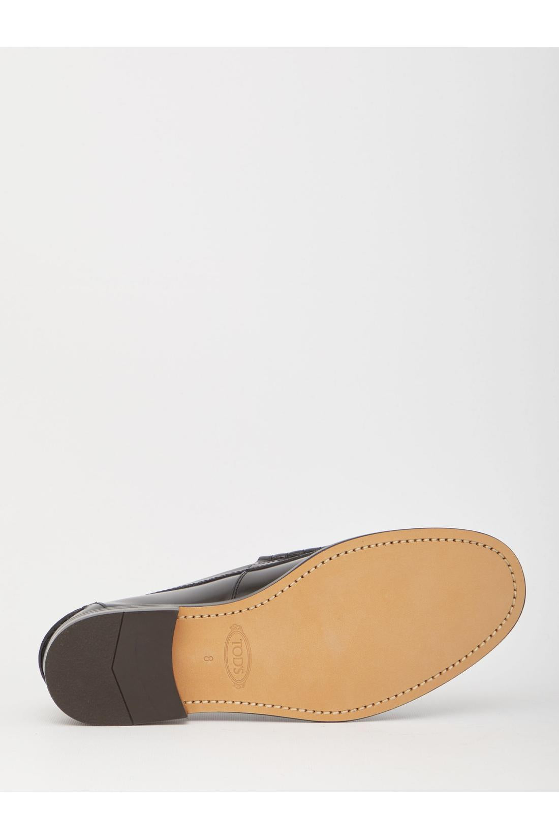 Black leather loafers