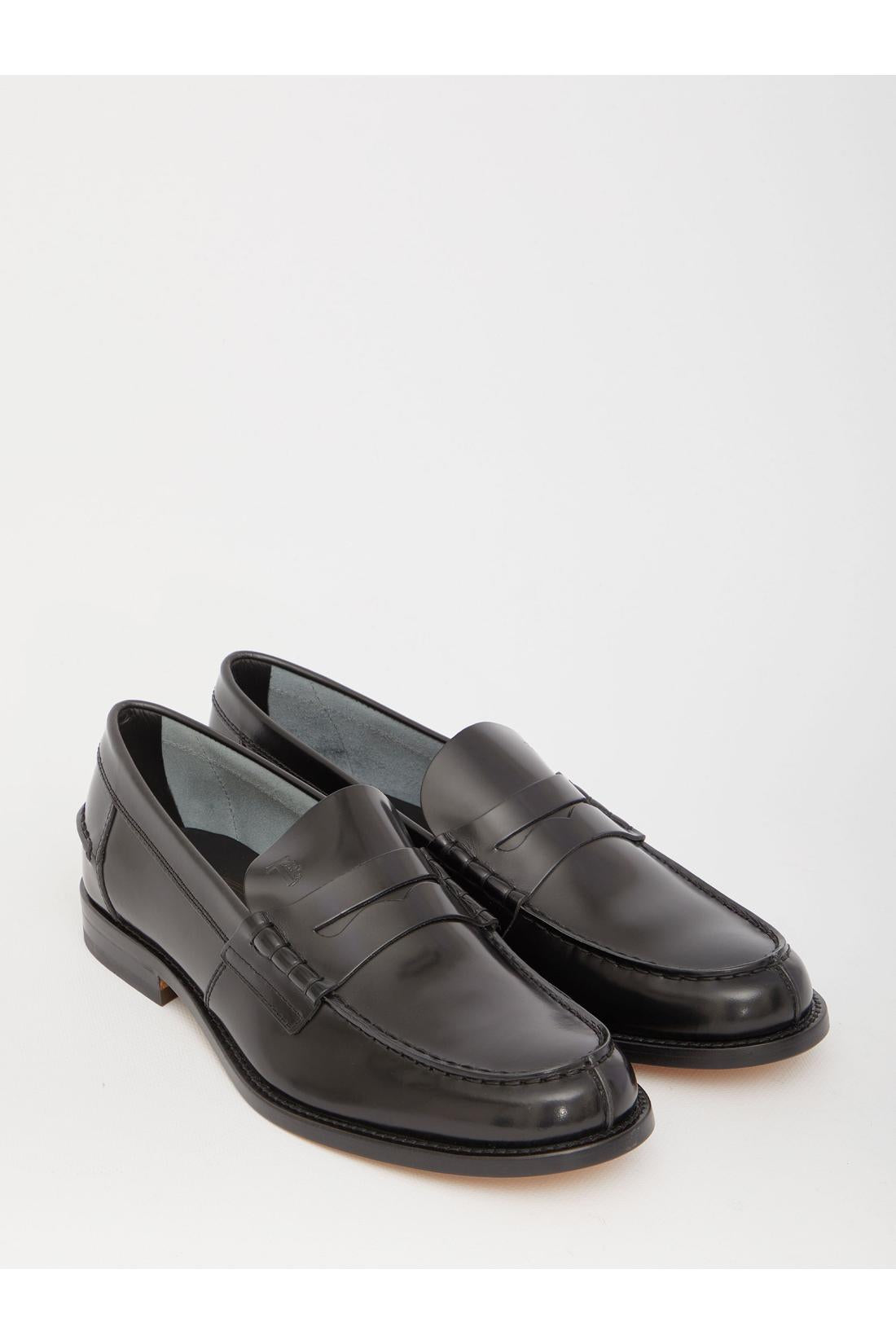 Black leather loafers