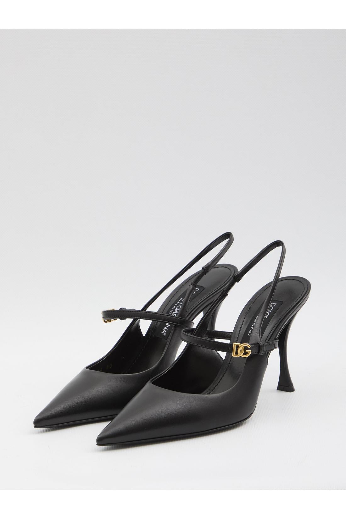 Black leather slingback pumps