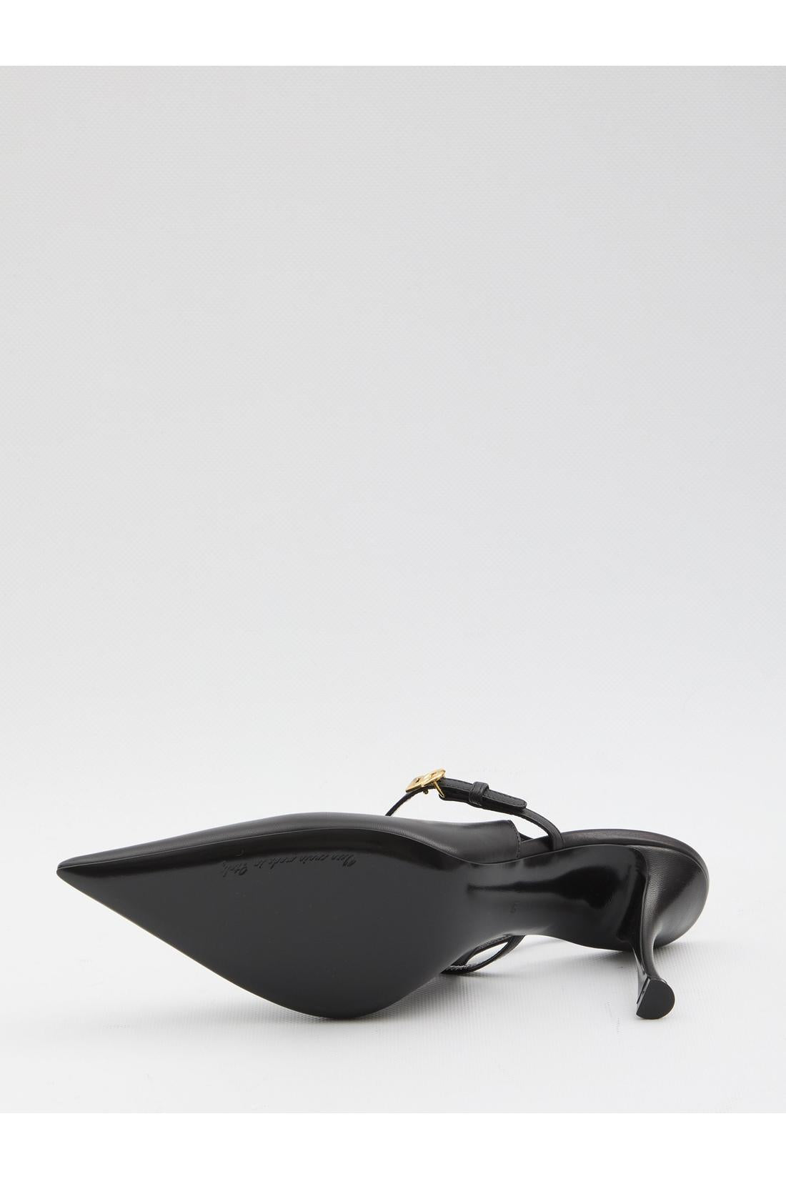 Black leather slingback pumps