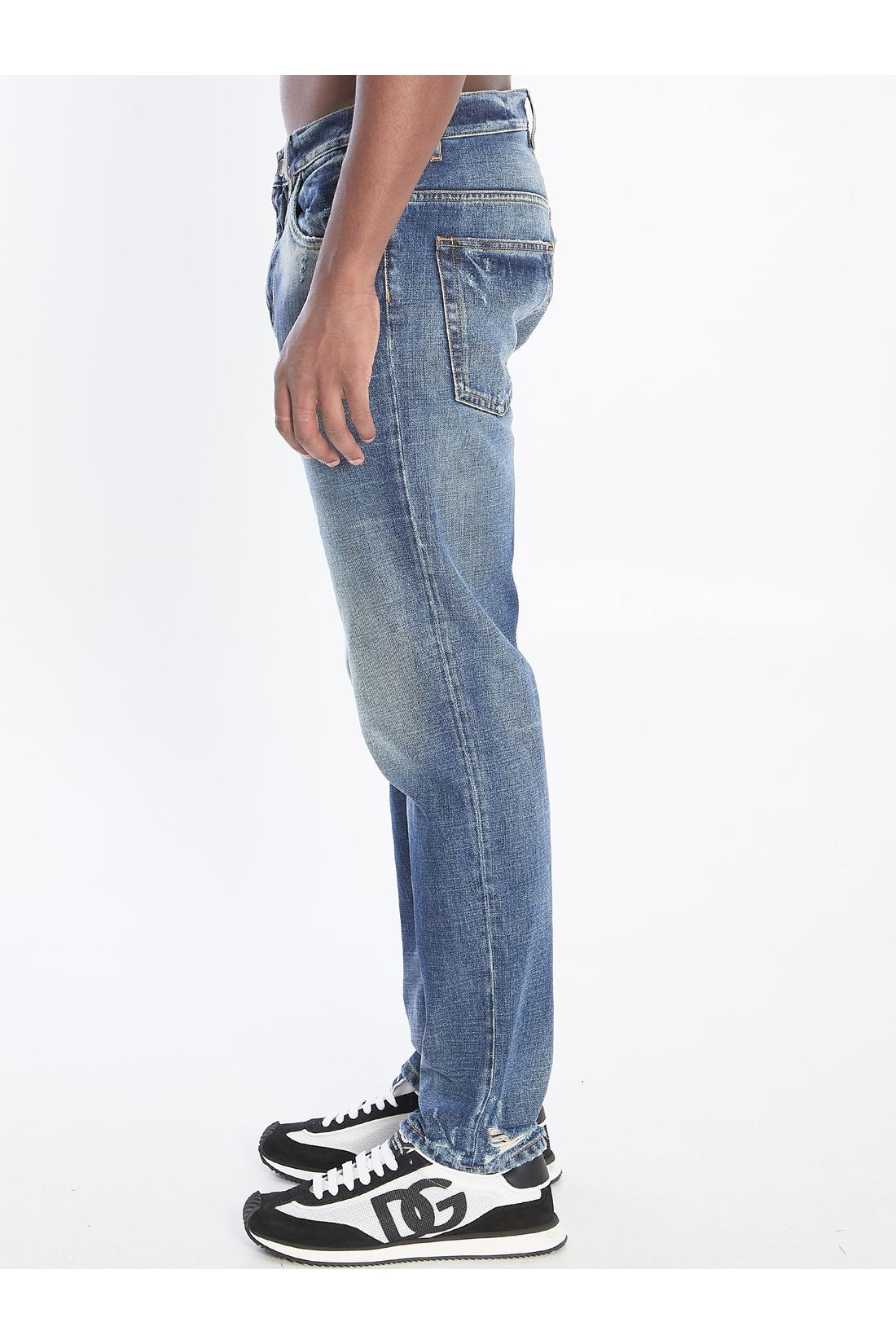 Denim pants with plaque