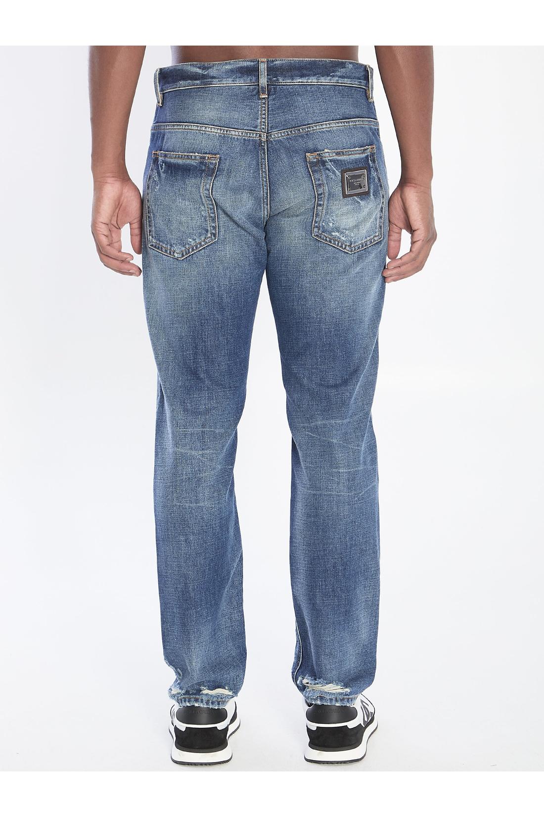 Denim pants with plaque