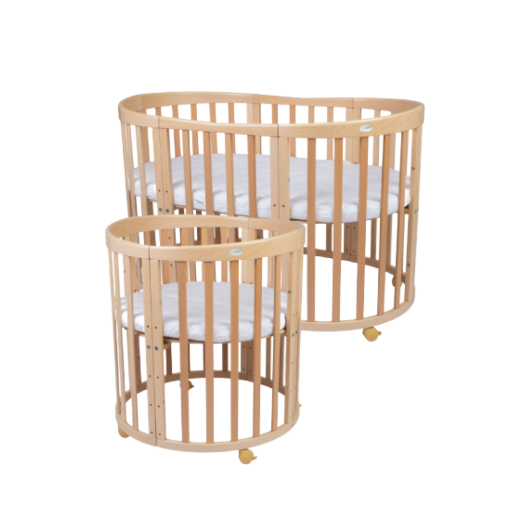 Babybett 7-in-1 – Ein Bett für viele Jahre - mitwachsend | Ovale Form