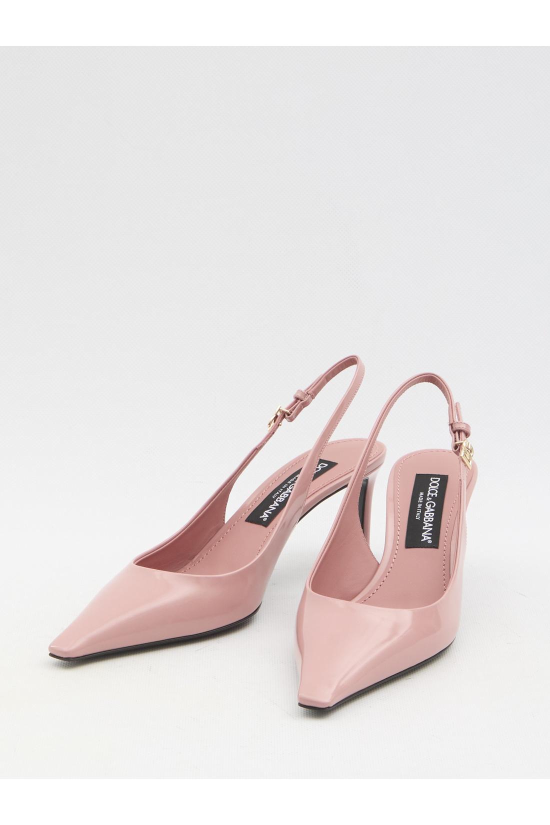 Pointed-toe slingback pumps