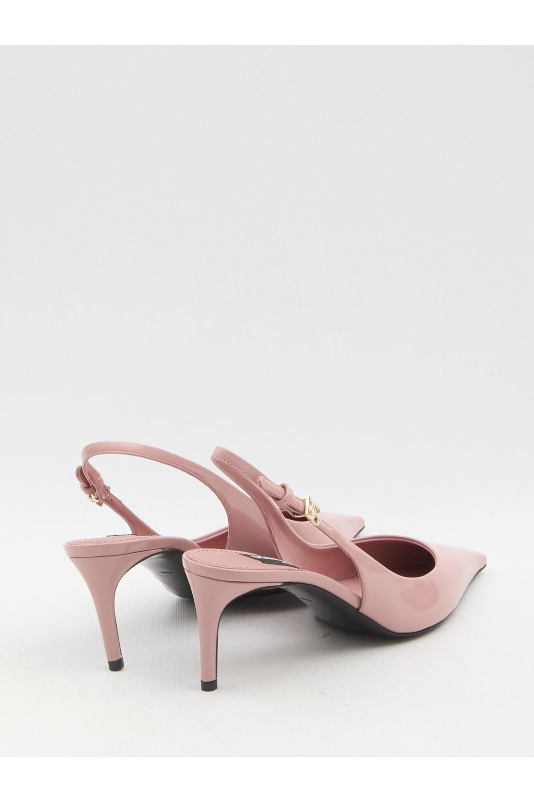 Pointed-toe slingback pumps