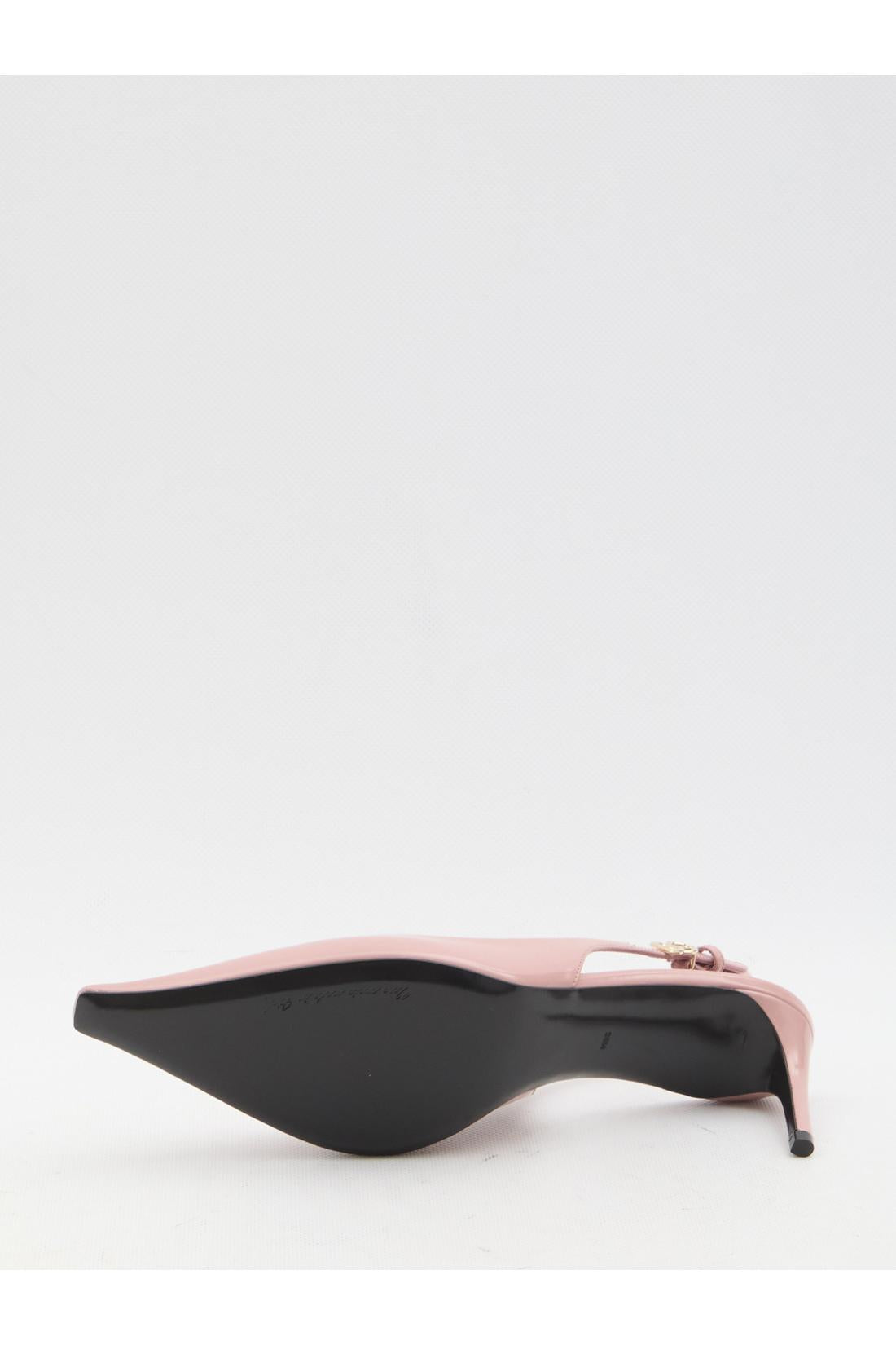 Pointed-toe slingback pumps