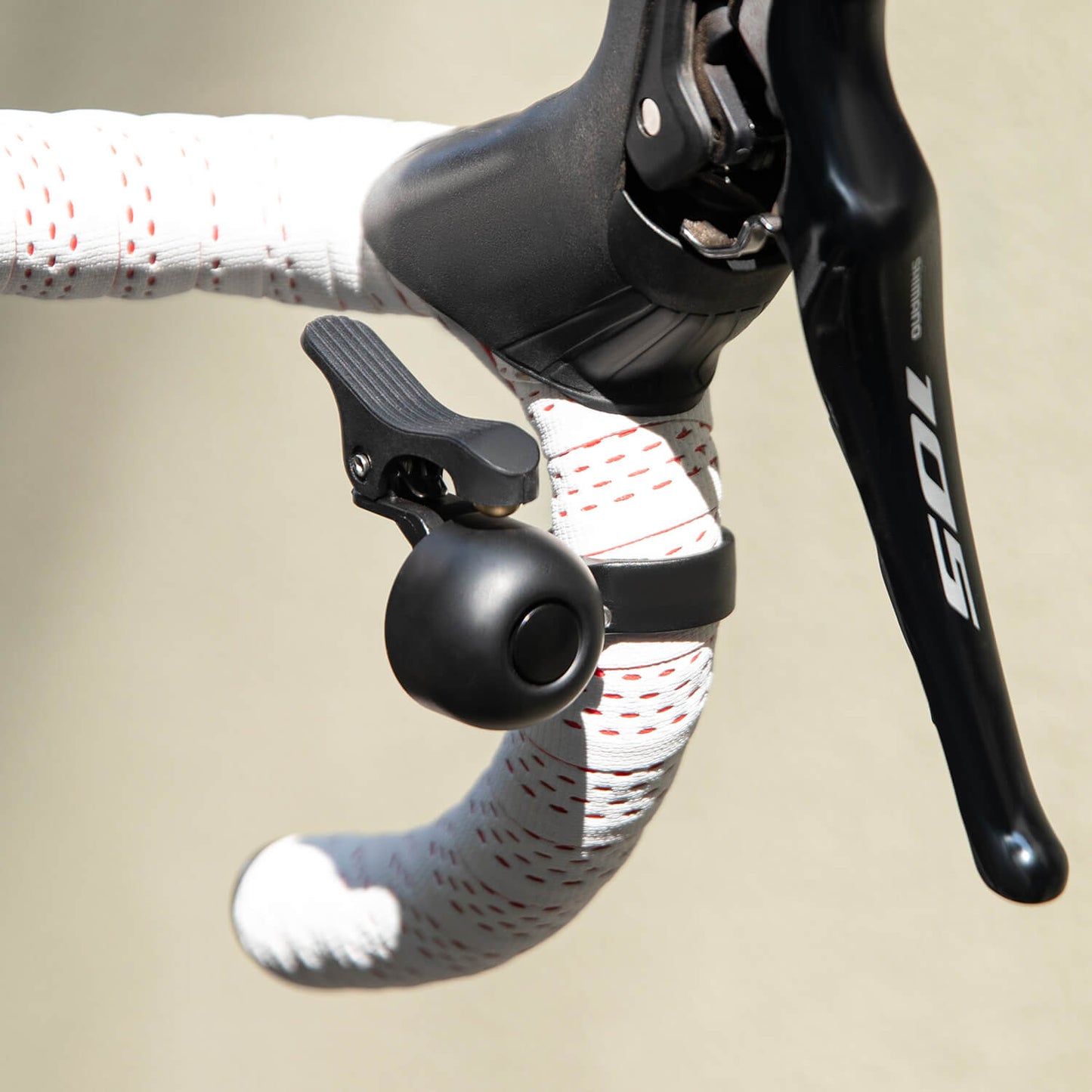 Road bike bell for curved handlebars 27-30 mm