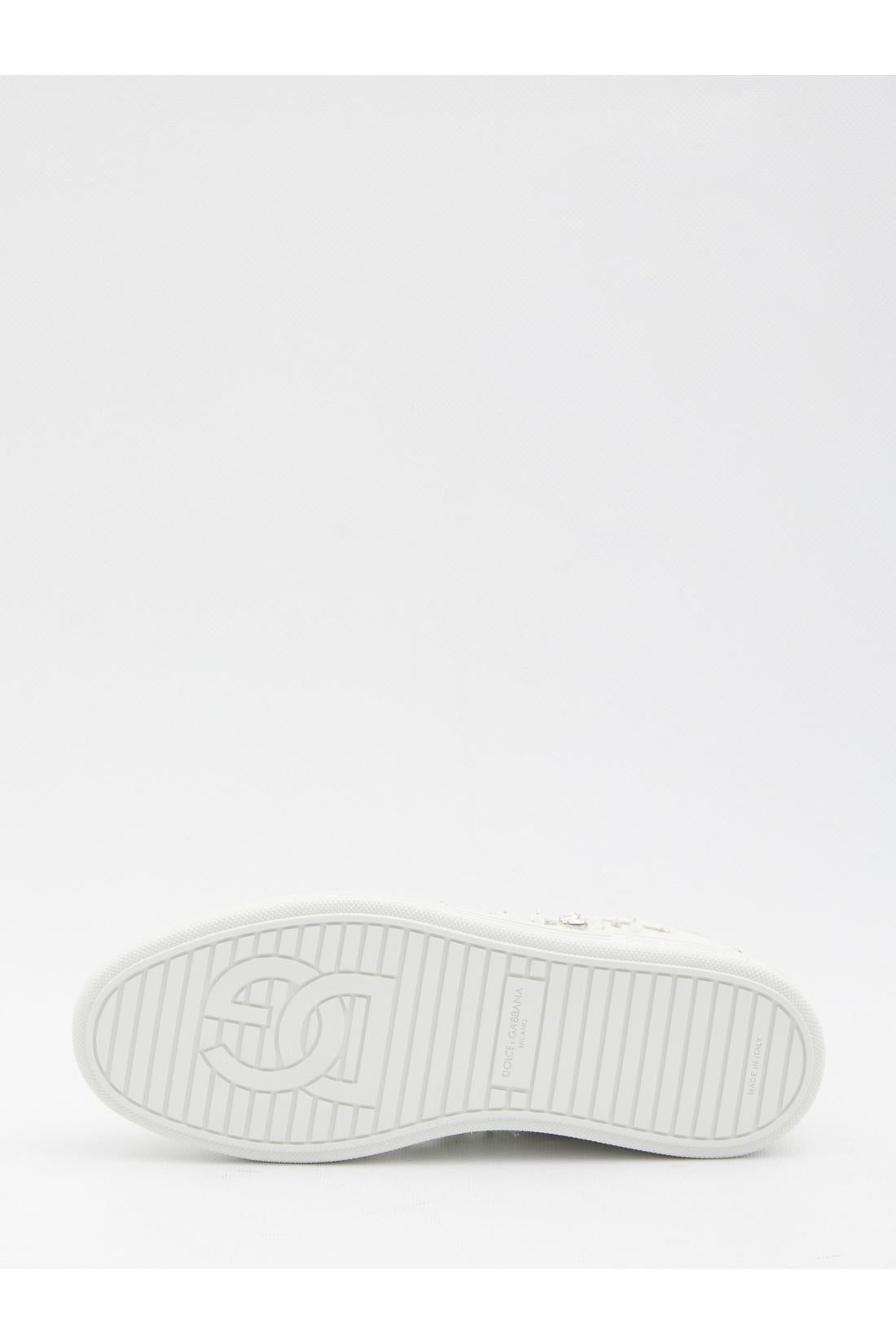 Sneakers embellished with rhinestones