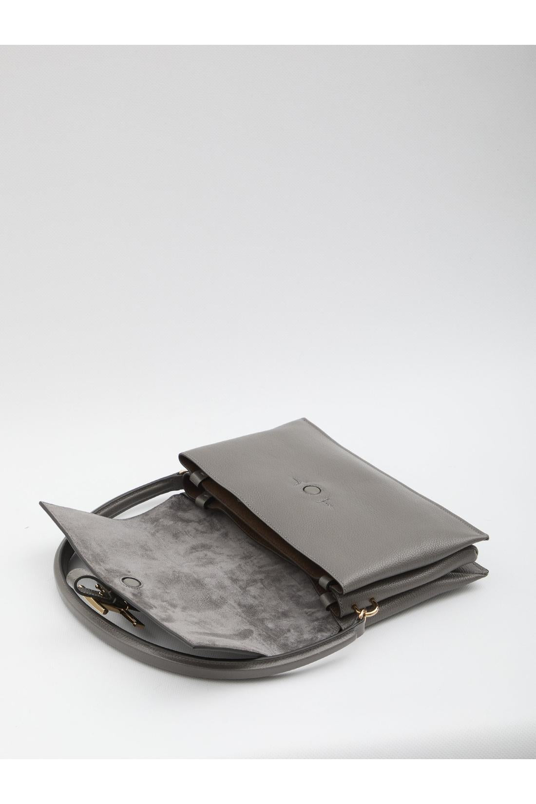 T Timeless flap bag in leather