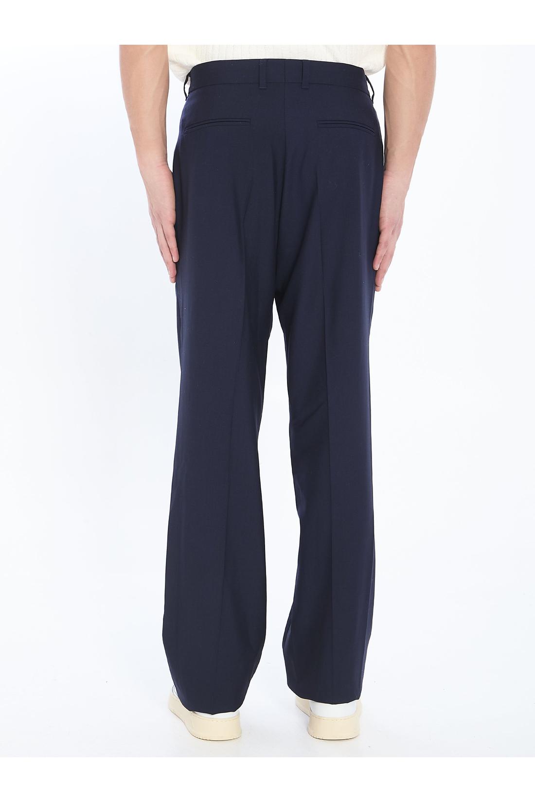 Tailored trousers with front pleats