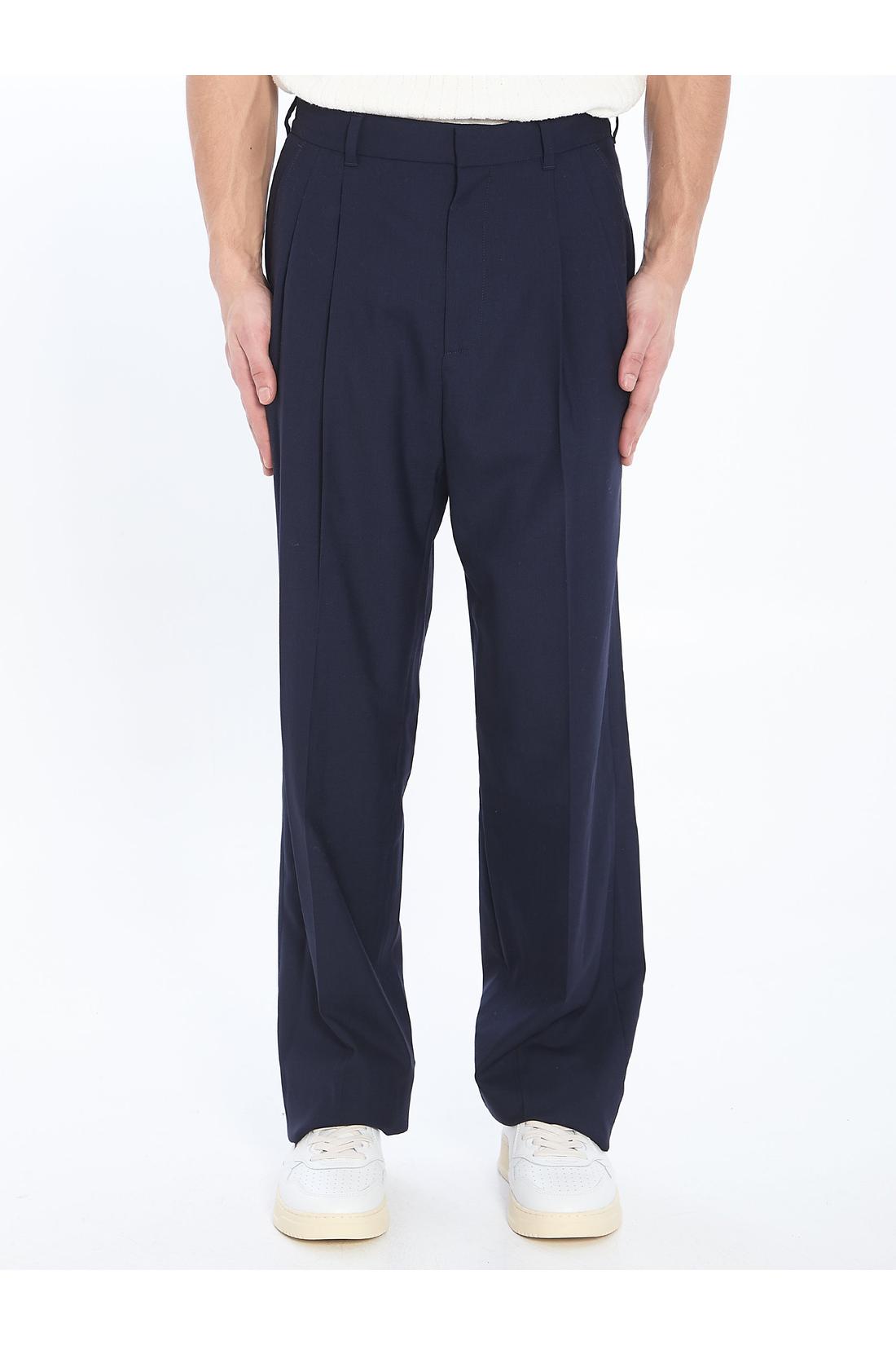 Tailored trousers with front pleats