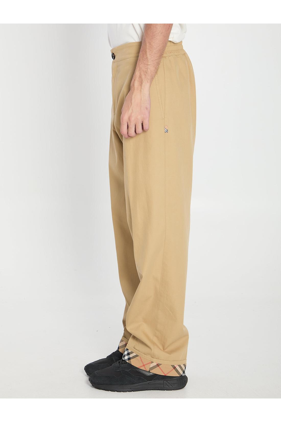 Trousers with elastic band