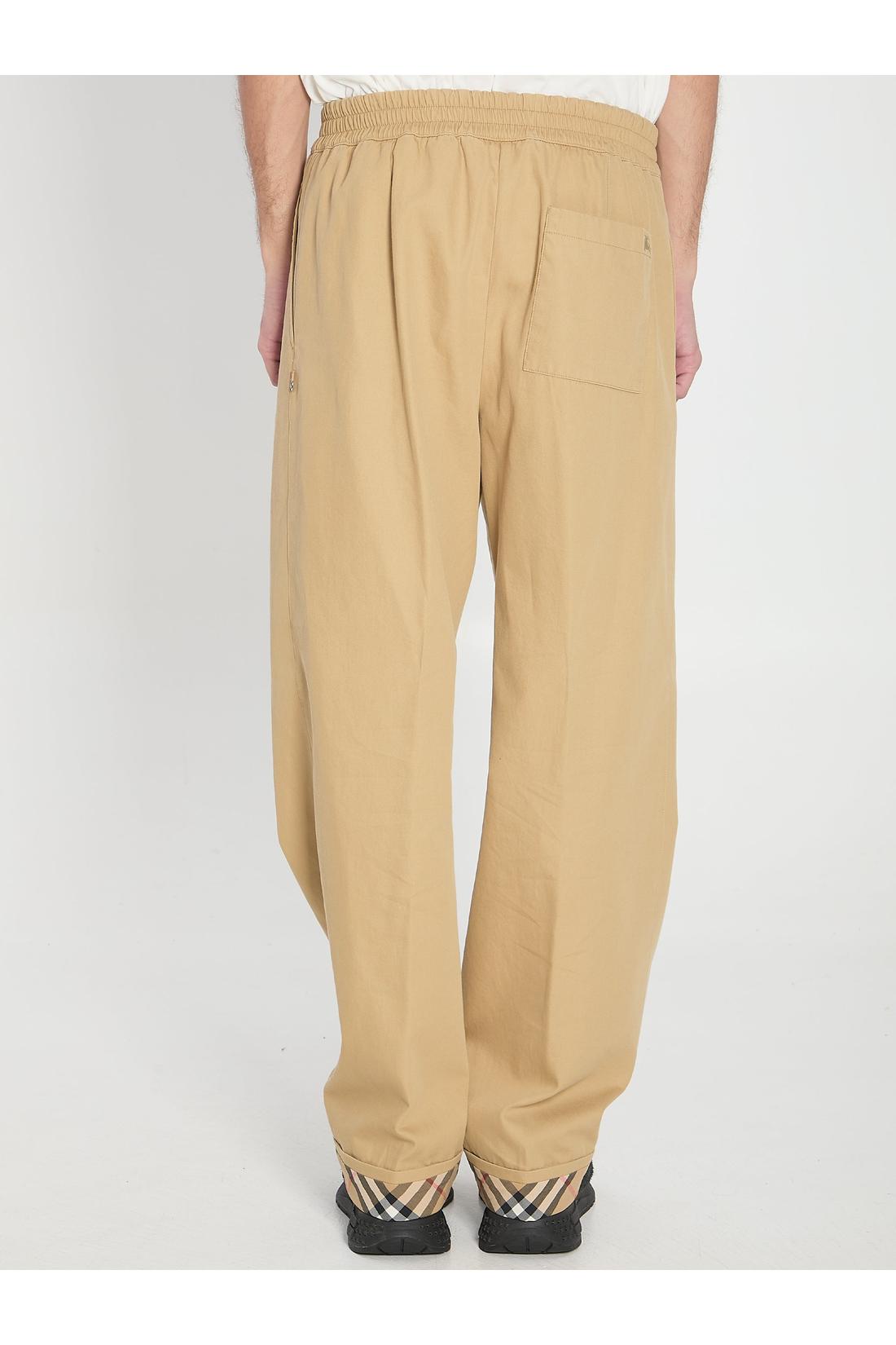 Trousers with elastic band
