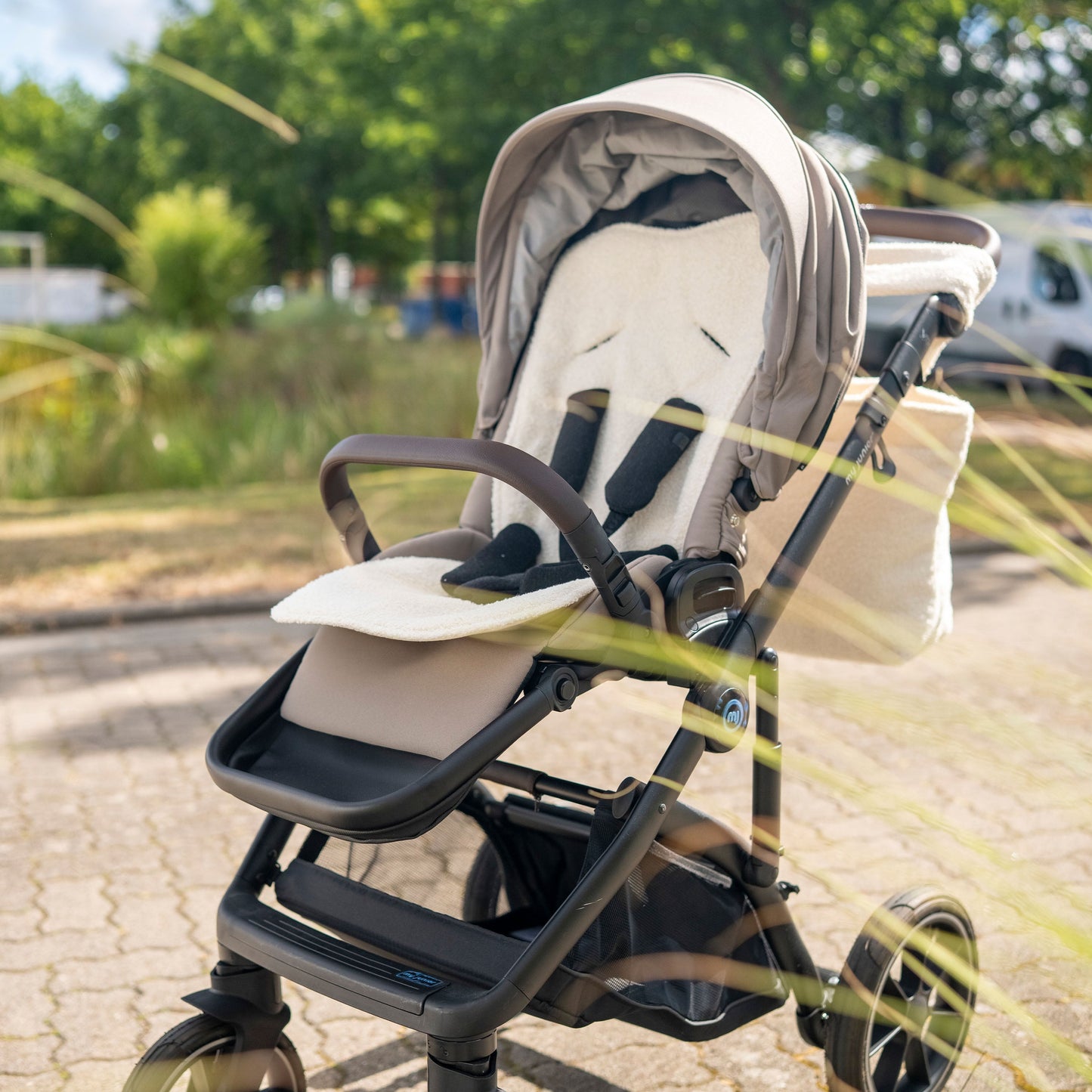 Sitzauflage Teddystoff Bouclé für den Kinderwagen - universell passend