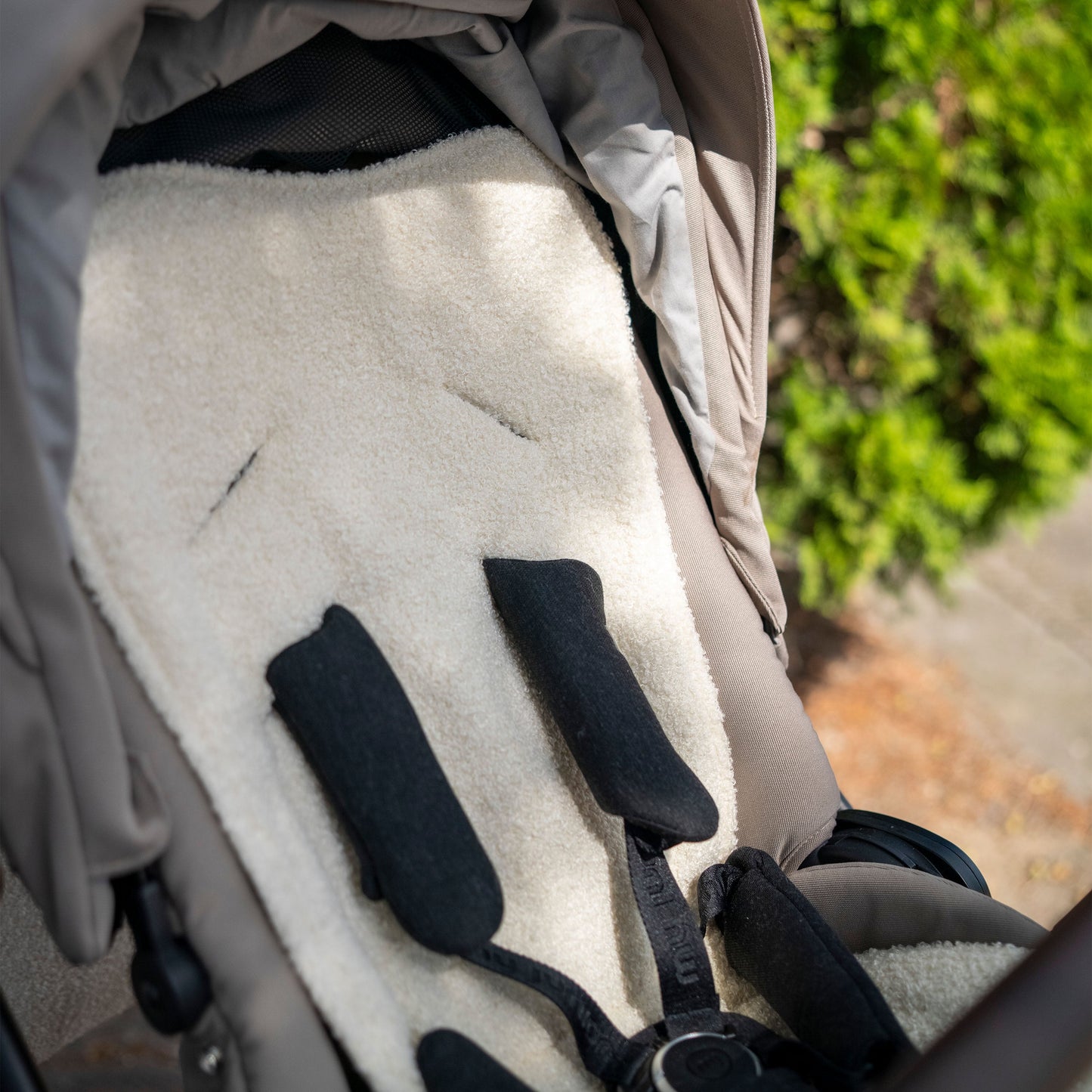 Sitzauflage Teddystoff Bouclé für den Kinderwagen - universell passend