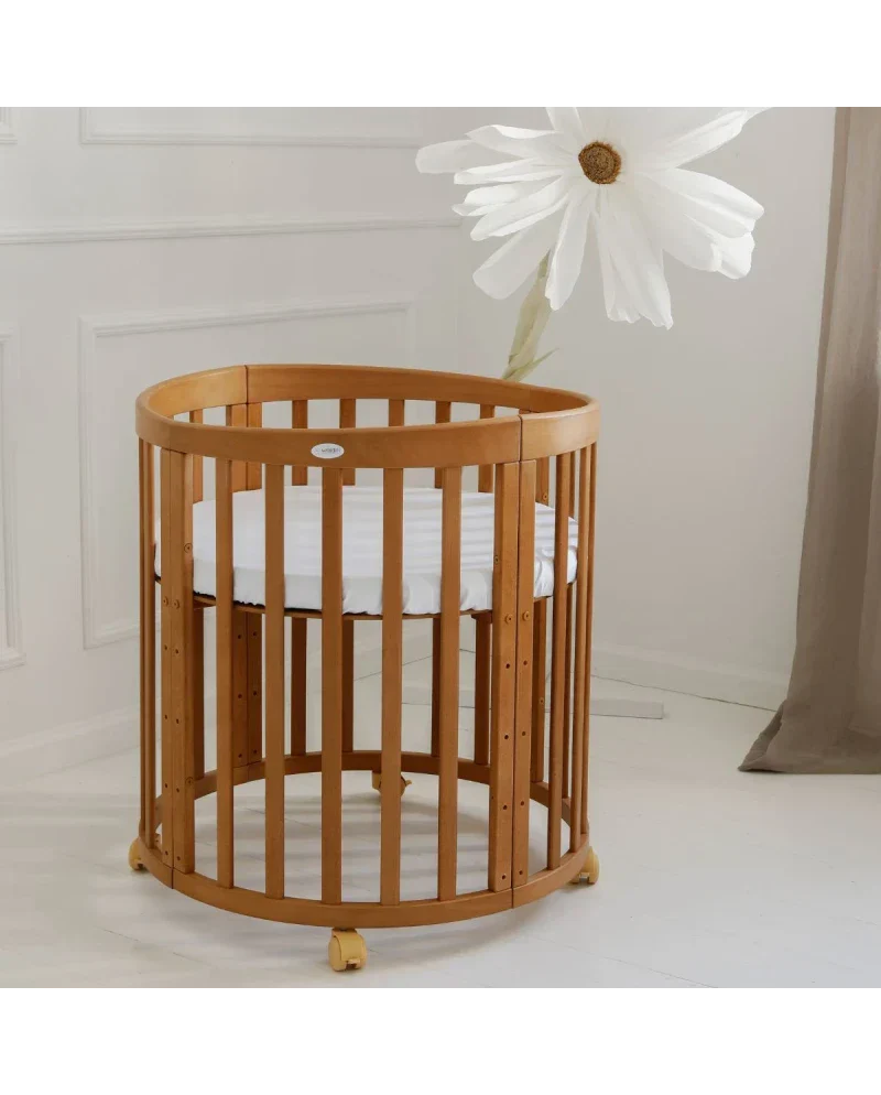 Babybett 7-in-1 – Ein Bett für viele Jahre - mitwachsend | Ovale Form